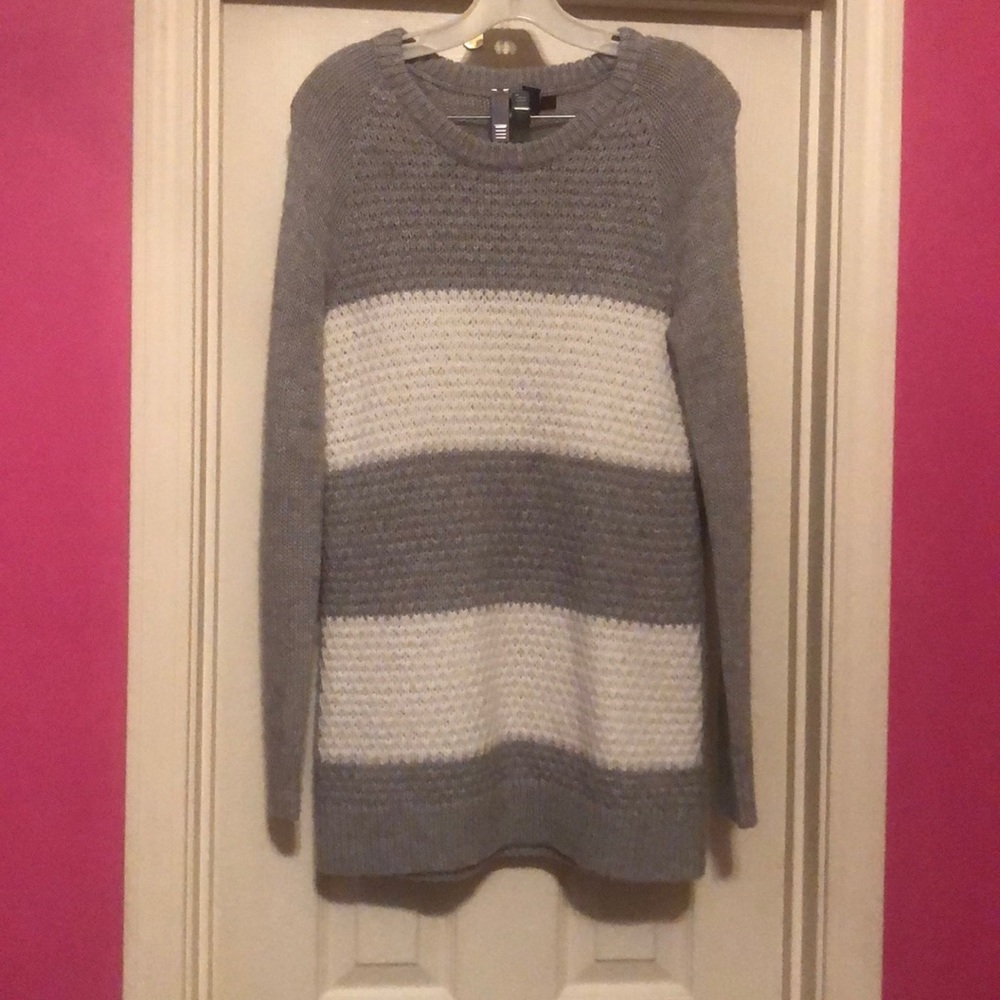 A warm gray and white stripped sweater.